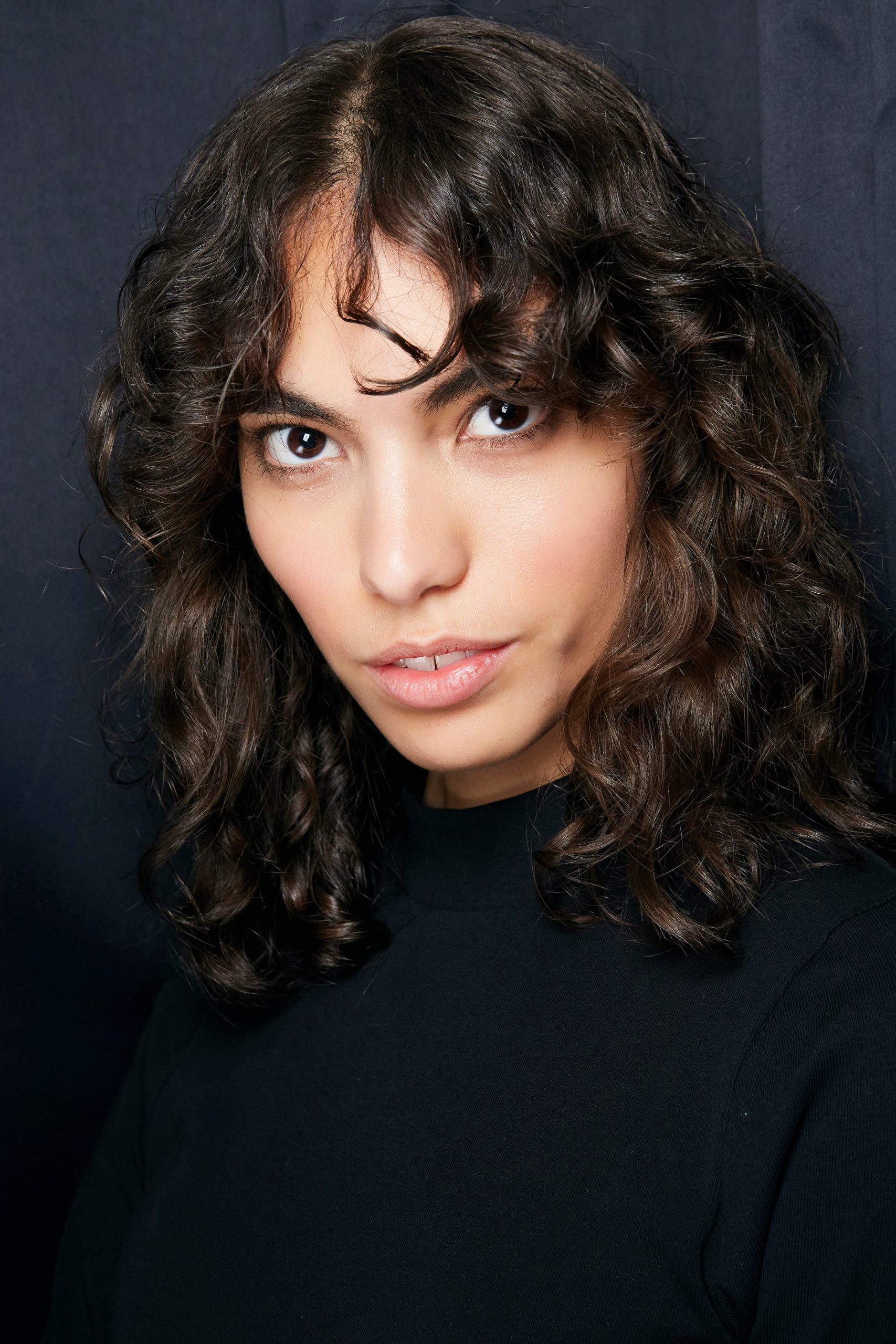 Collarbone Dark Brown Layers With Curtain Bangs Collarbone Dark Brown Layers With Curtain Bangs — Winter Haircuts for Curly Hair
