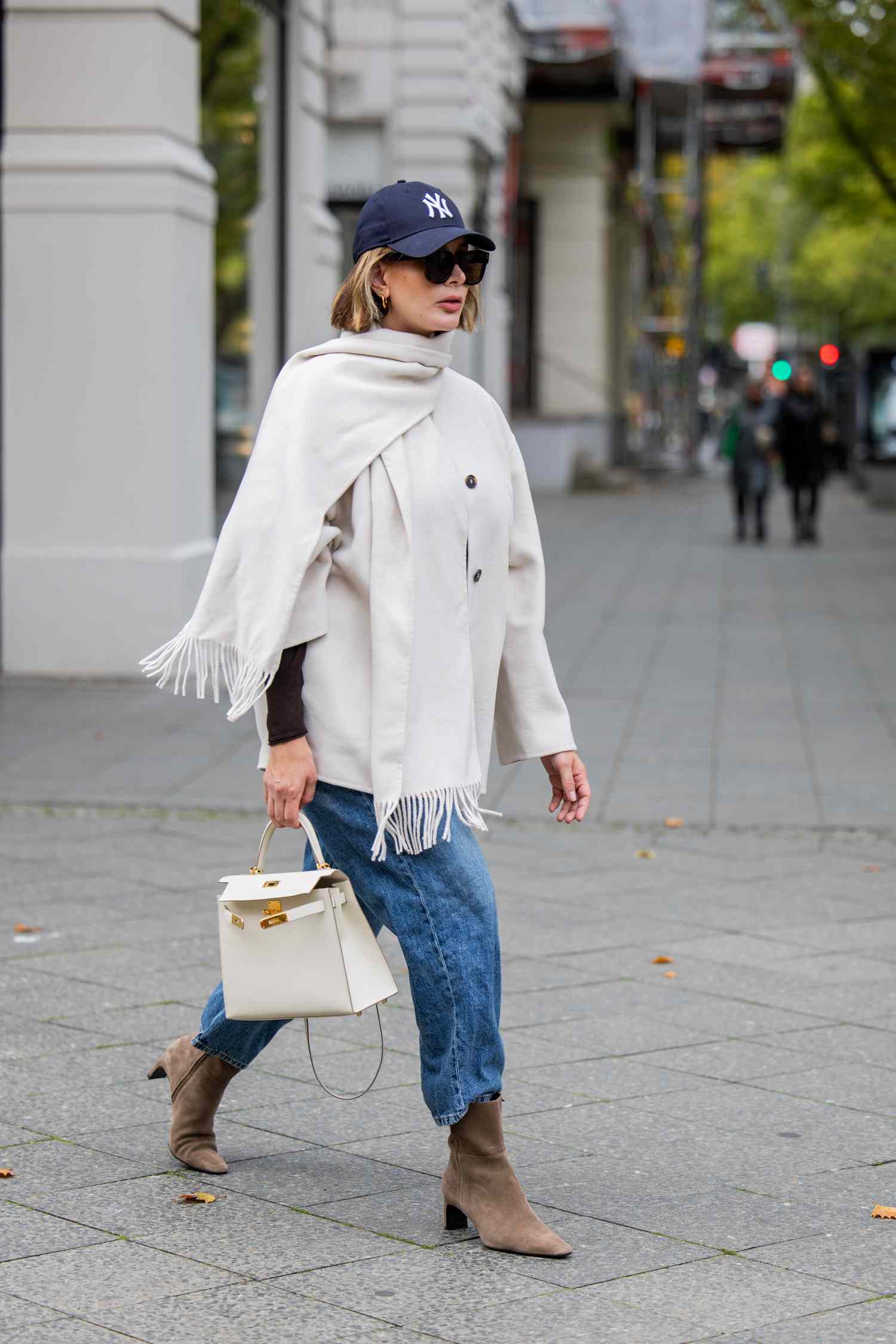 Cropped Jeans with an Oversized Fringed Scarf and Cream Coat — Winter Outfits with Jeans