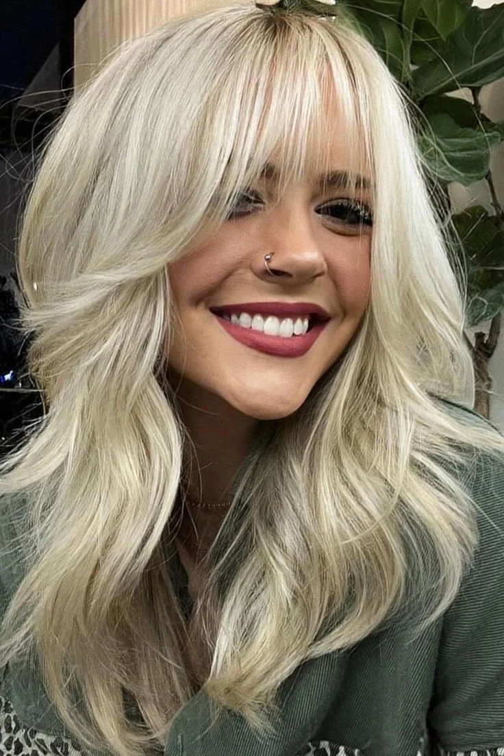 Platinum Blonde Layered Shag With Volume Platinum Blonde Layered Shag With Volume — Winter Haircuts with Curtain Bangs