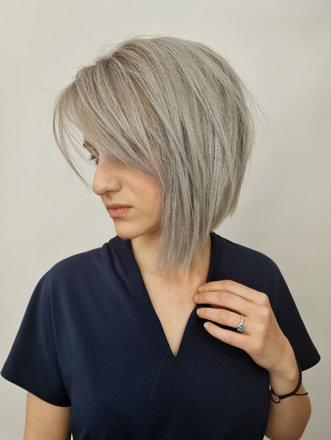 Angled Bob With Textured Side Bangs Angled Bob With Textured Side Bangs — Winter Haircuts for Thin Hair