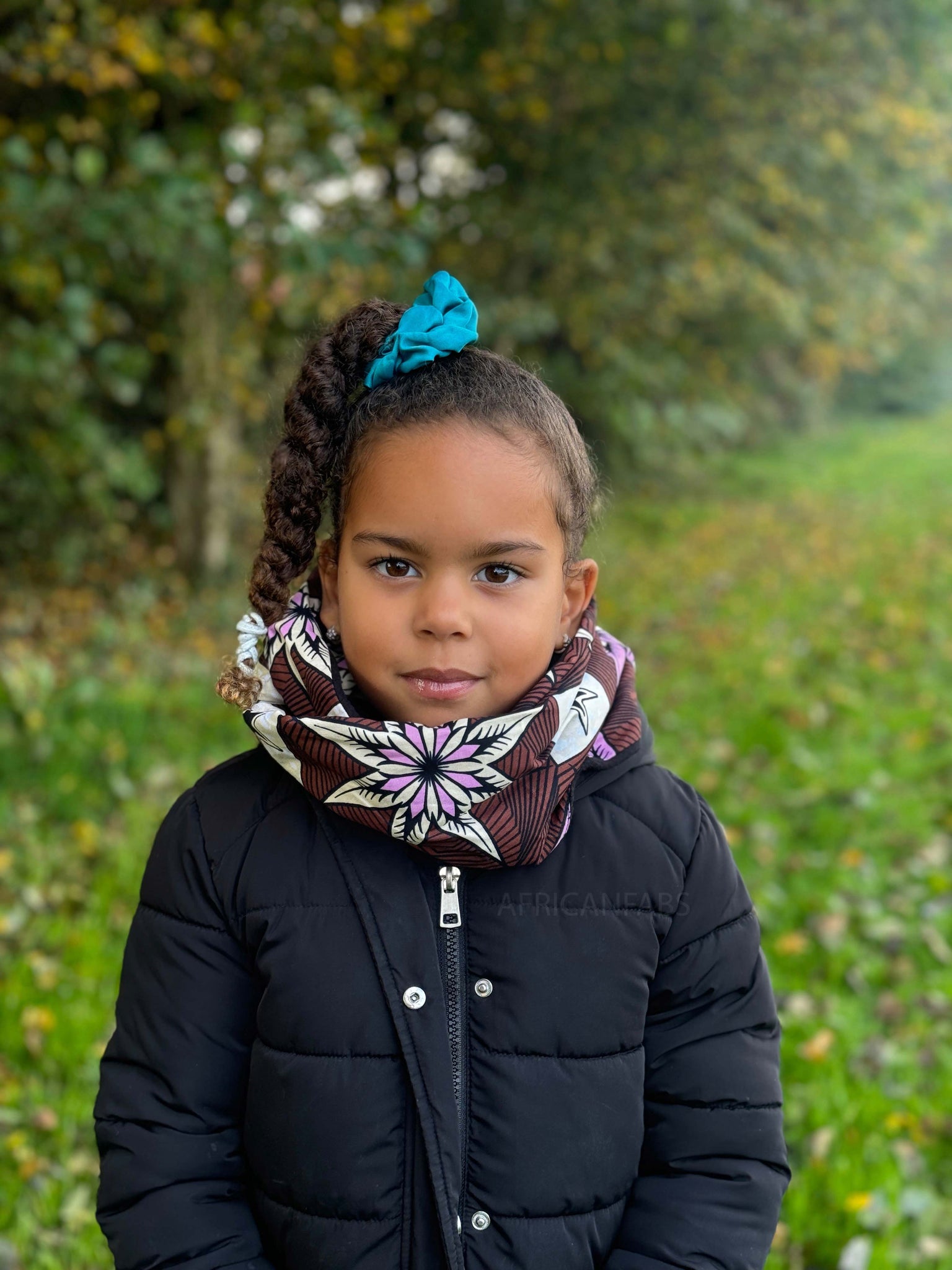Single Thick Braid With Blue Scrunchie — Winter Hairstyles for Black Kids