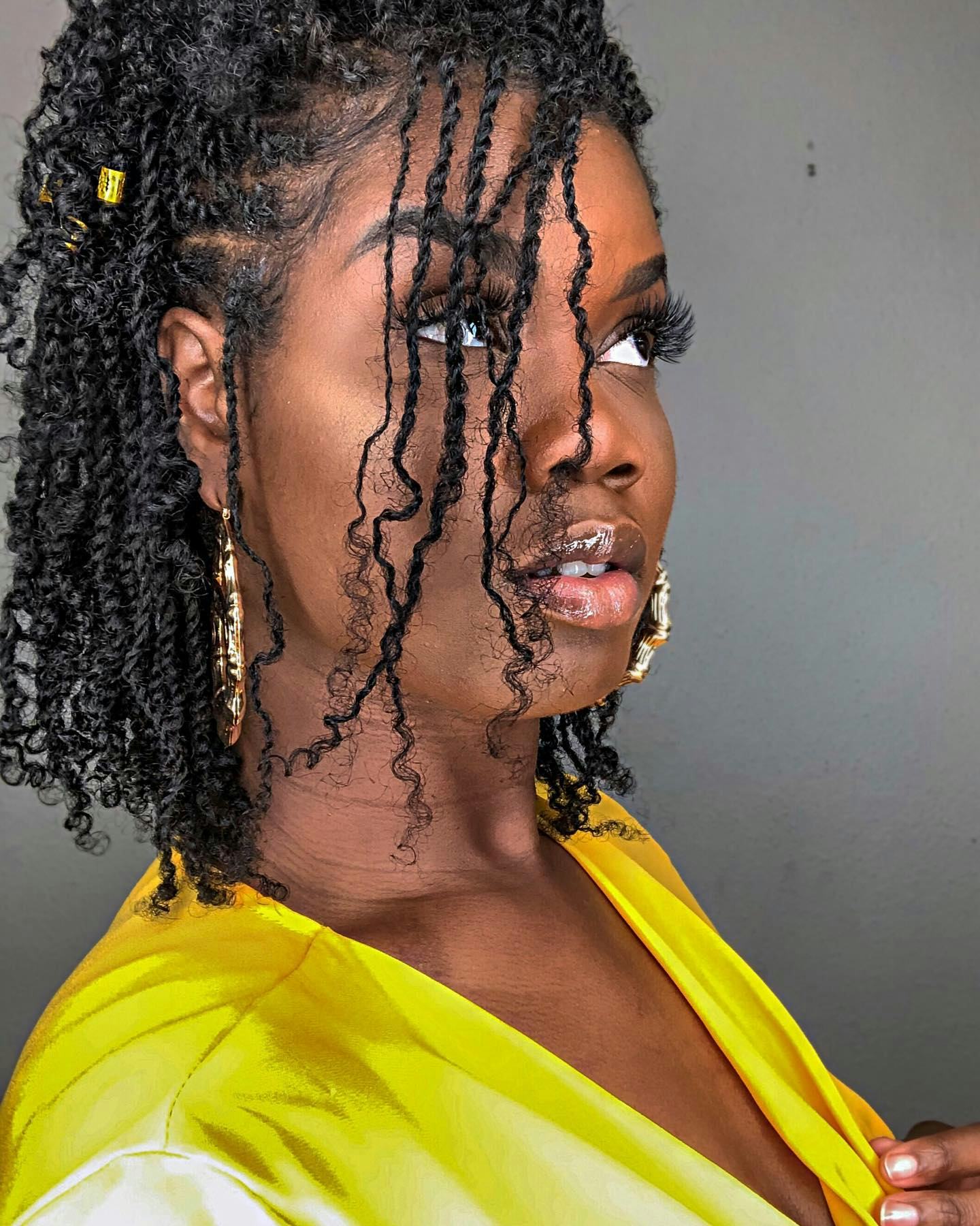 Curly Bob With Side-Swept Bangs Curly Bob With Side-Swept Bangs — Winter Protective Hairstyles