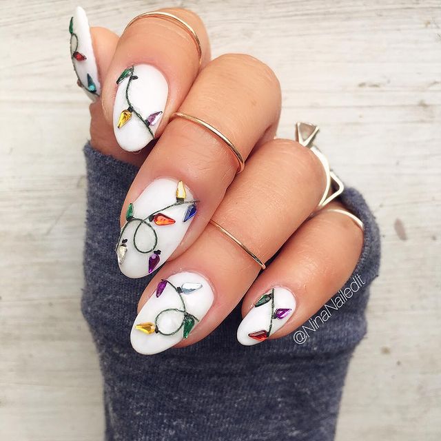 White Almond Nails with Christmas Lights White Almond Nails with Christmas Lights — Short Winter Acrylic Nails
