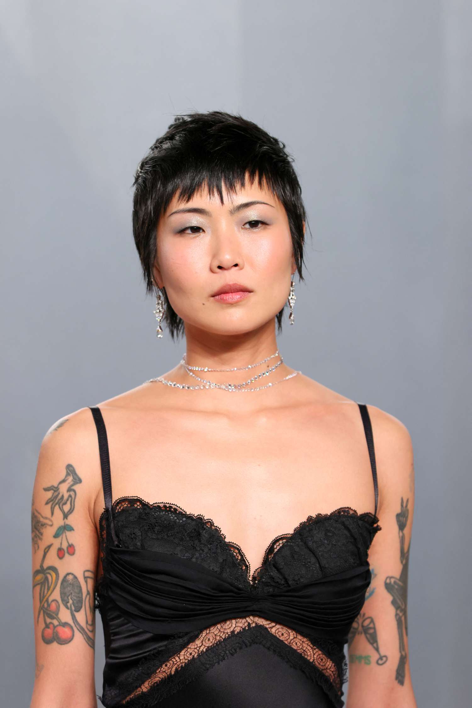 Short Layered Piecey Black Pixie With Textured Bangs Short Layered Piecey Black Pixie With Textured Bangs — Winter Haircuts for Heart Shaped Faces