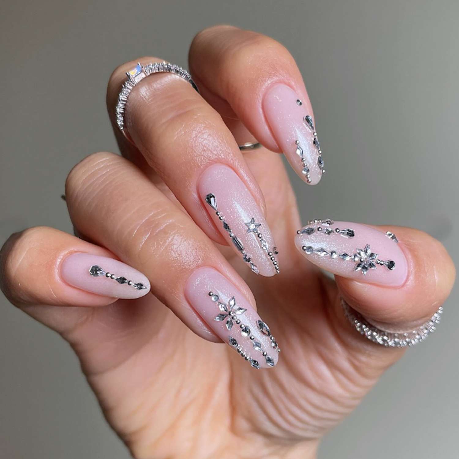 Pale Pink Rhinestone Snowflake Nails Pale Pink Rhinestone Snowflake Nails — Winter Nail Designs