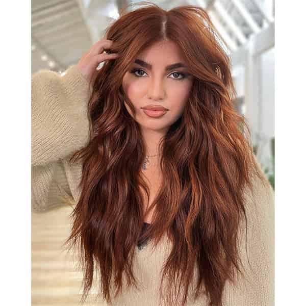 Rich Copper Hue And Voluminous Waves Deep Copper With Voluminous Curtain Bangs Rich Copper Hue And Voluminous Waves Deep Copper With Voluminous Curtain Bangs — Winter Copper Hair Color