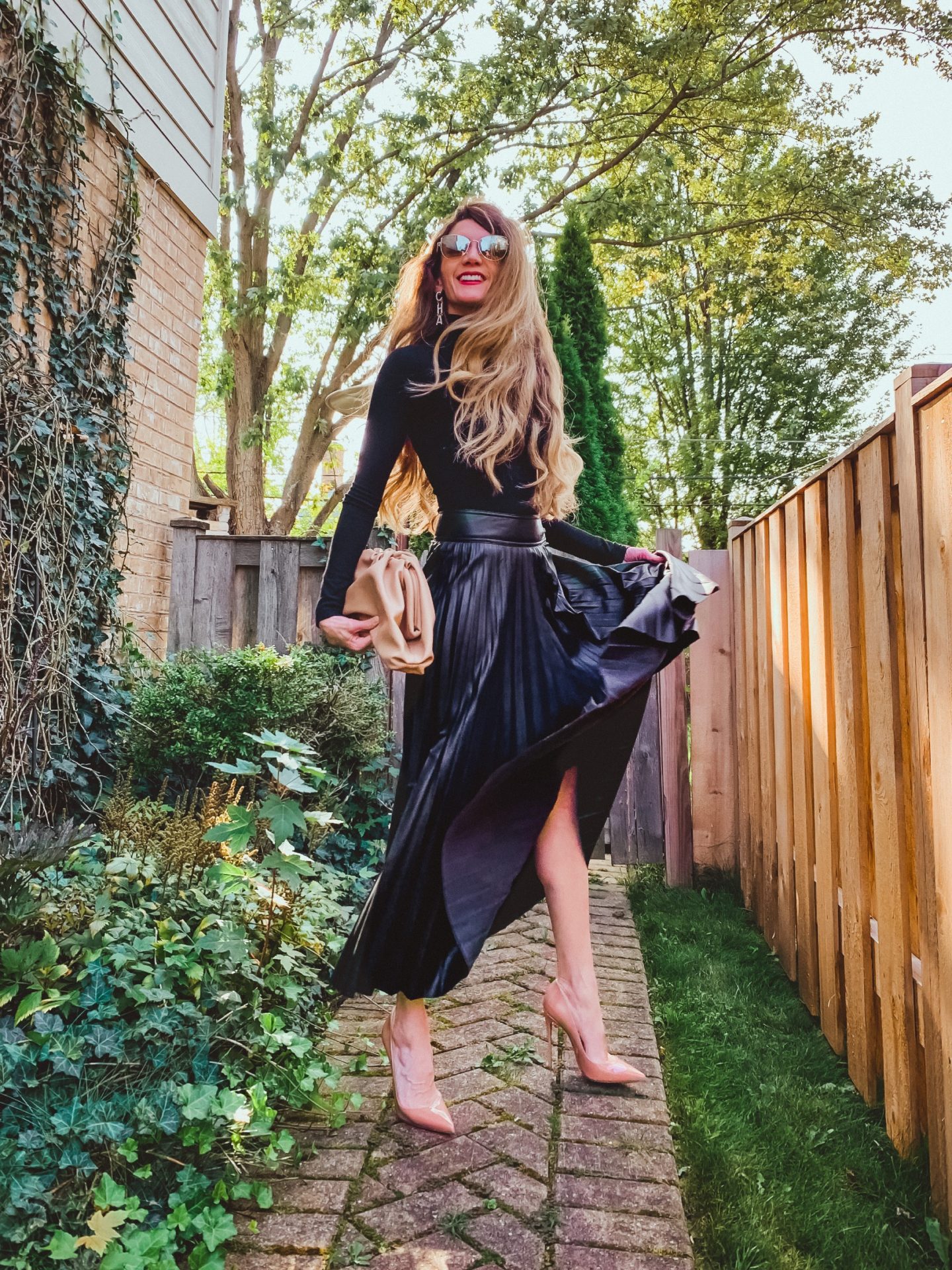 Feminine Flair: Black Pleated Leather Midi Skirt with Turtleneck and Heels Feminine Flair: Black Pleated Leather Midi Skirt with Turtleneck and Heels — Leather Skirt Outfits