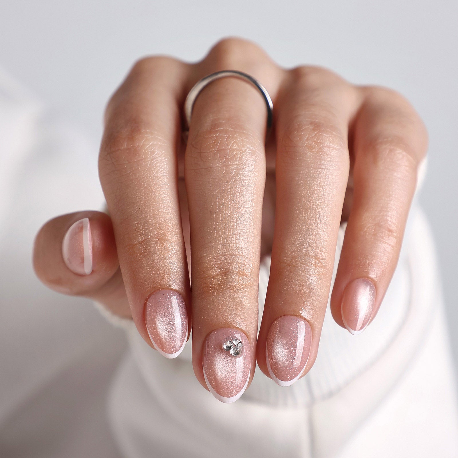 Single Small Rhinestone On Accent Nail Visual Idea Single Small Rhinestone On Accent Nail Visual Idea — Short Winter Almond Nails
