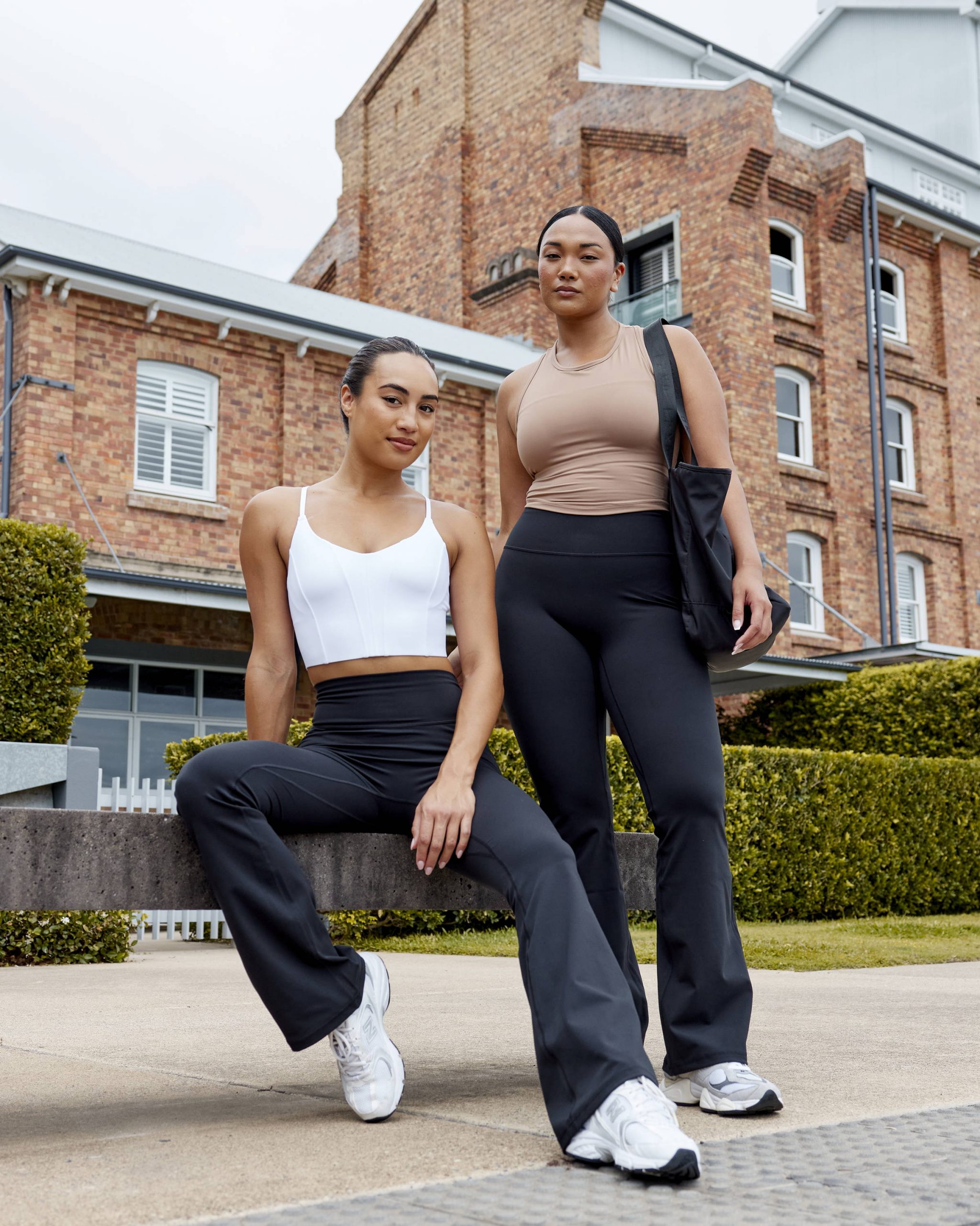 Clean and Simple: White Crop Top and Sneakers — Flare Leggings Outfits