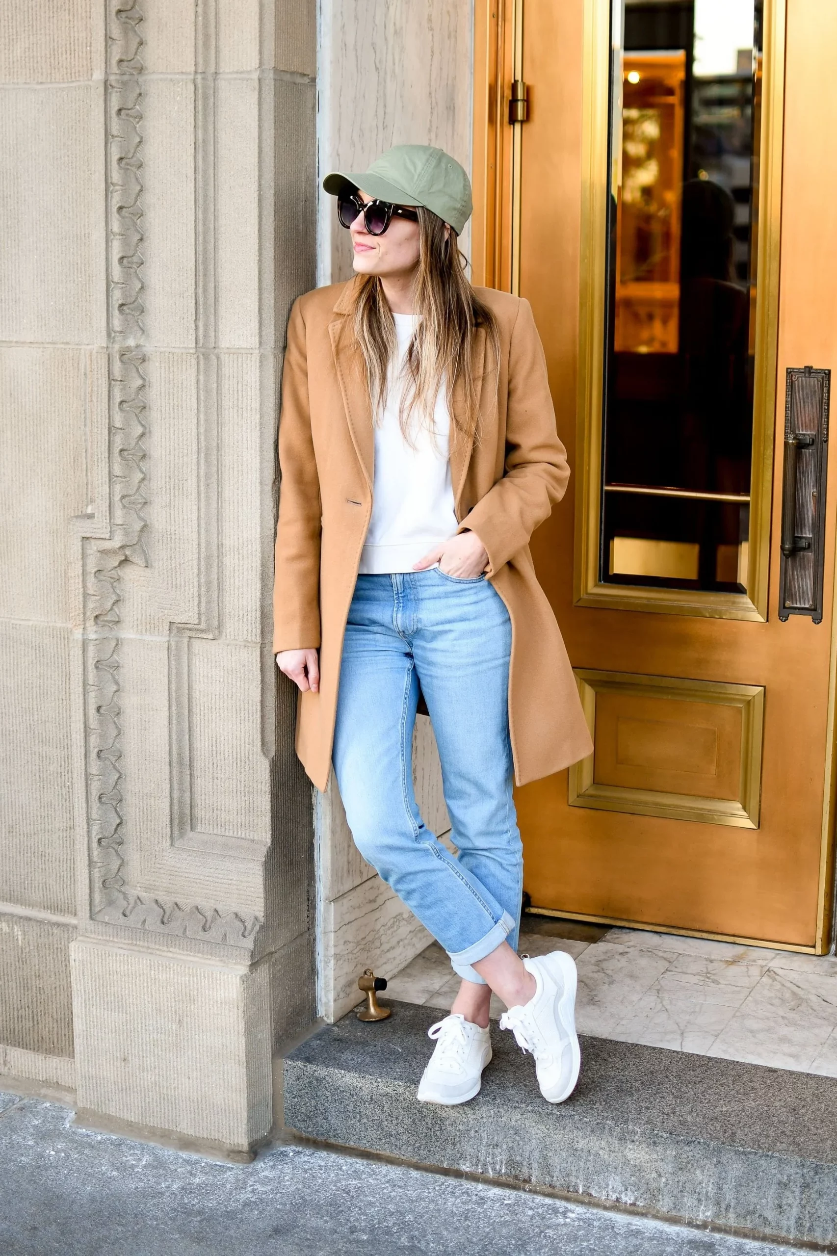 Camel Wool Coat Over White Tee and Light Wash Jeans — Winter to Spring Transition Outfits
