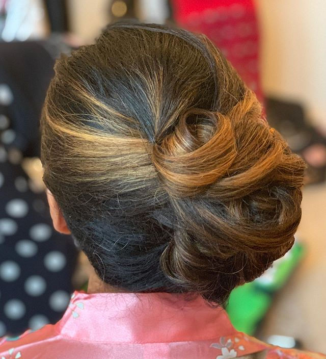Dark Brown Swirled Chignon — Winter Wedding Guest Hairstyles