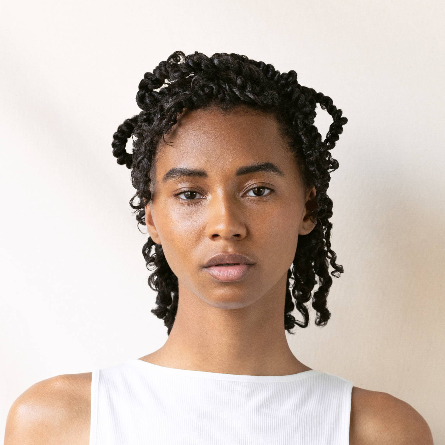 Polished Twisted Updo Polished Twisted Updo — Winter Hairstyles for Curly Hair