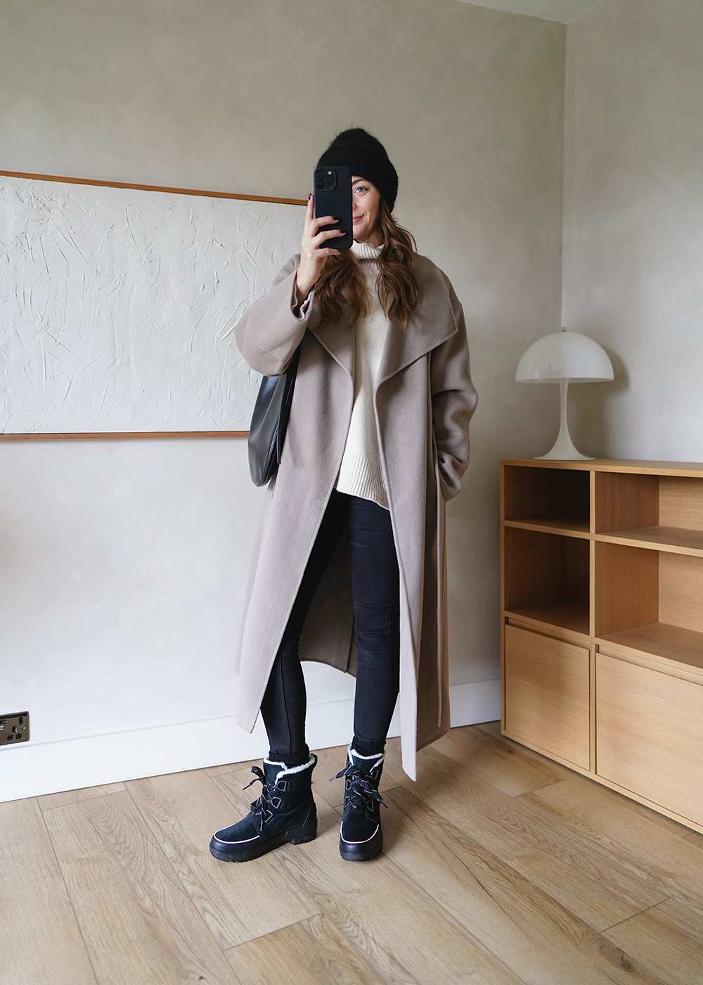 Black Snow Boots with Long Beige Coat and Cream Turtleneck — Winter Boots Outfits