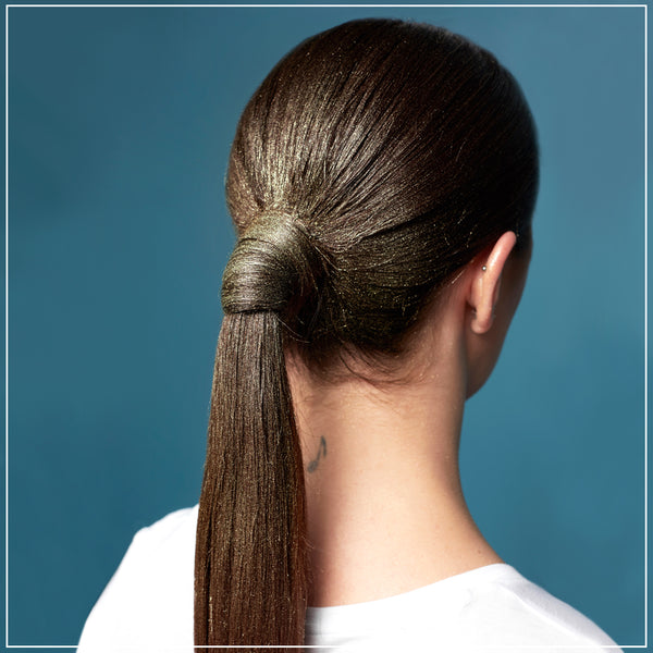 Low Ponytail With Twisted Detail — Winter Date Night Hairstyles