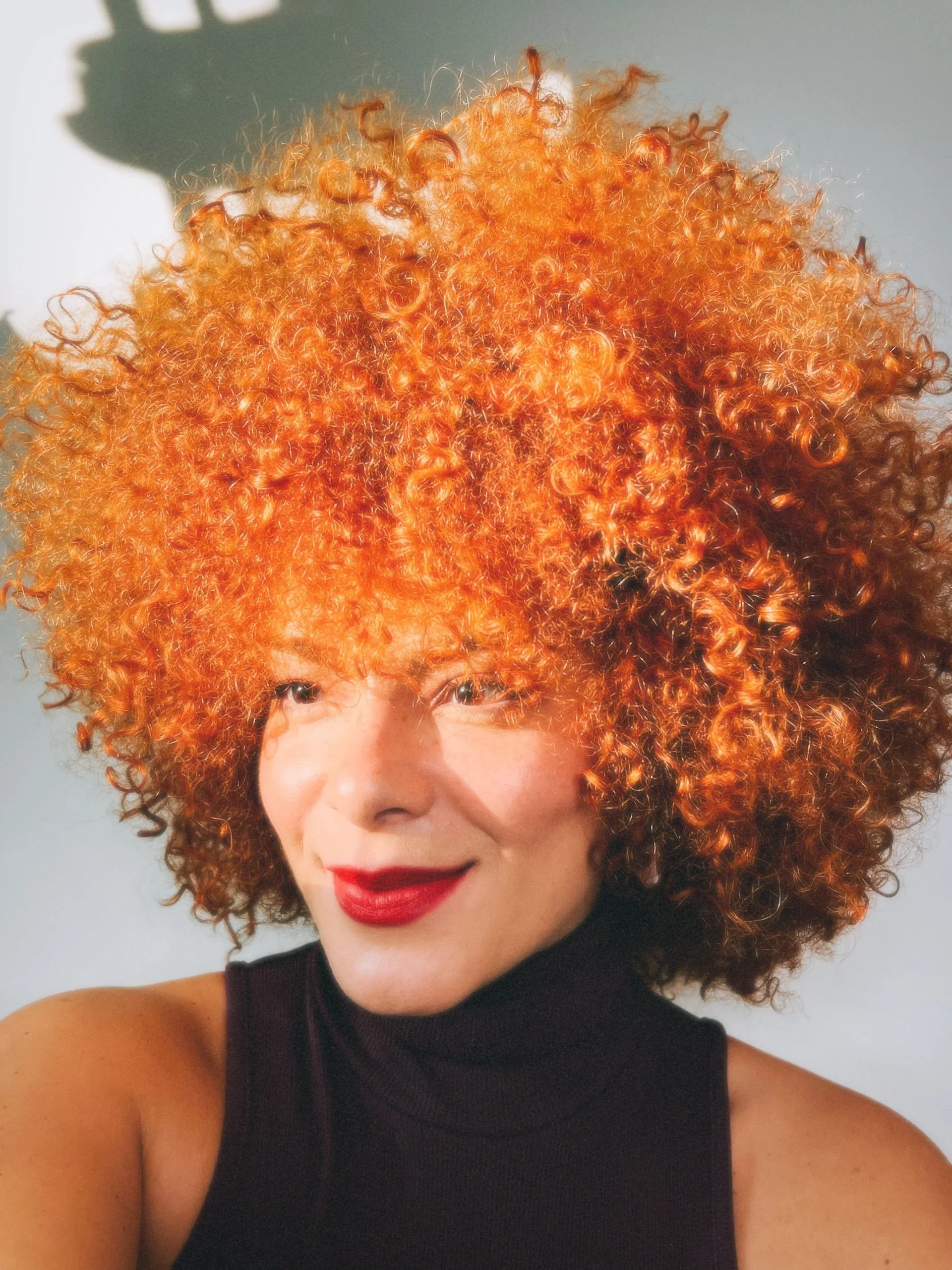 Vibrant Copper Coily Hair Vibrant Copper Coily Hair — Winter Haircuts for Curly Hair