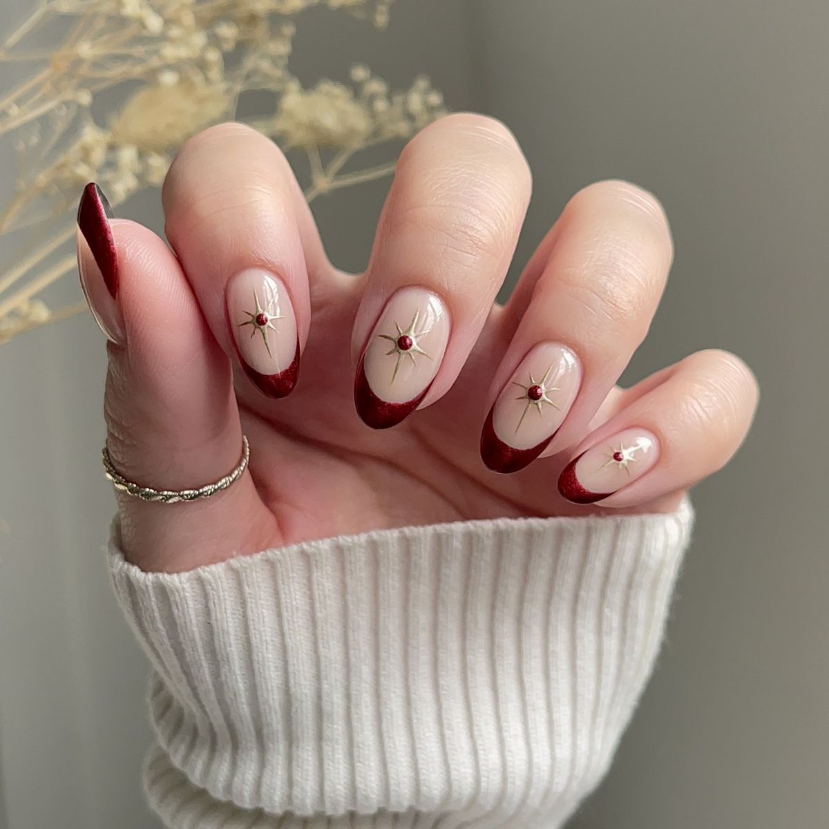 Nude Base Red French Tip Starburst Oval Nails Nude Base Red French Tip Starburst Oval Nails — Winter Nail Colors for Women Over 50