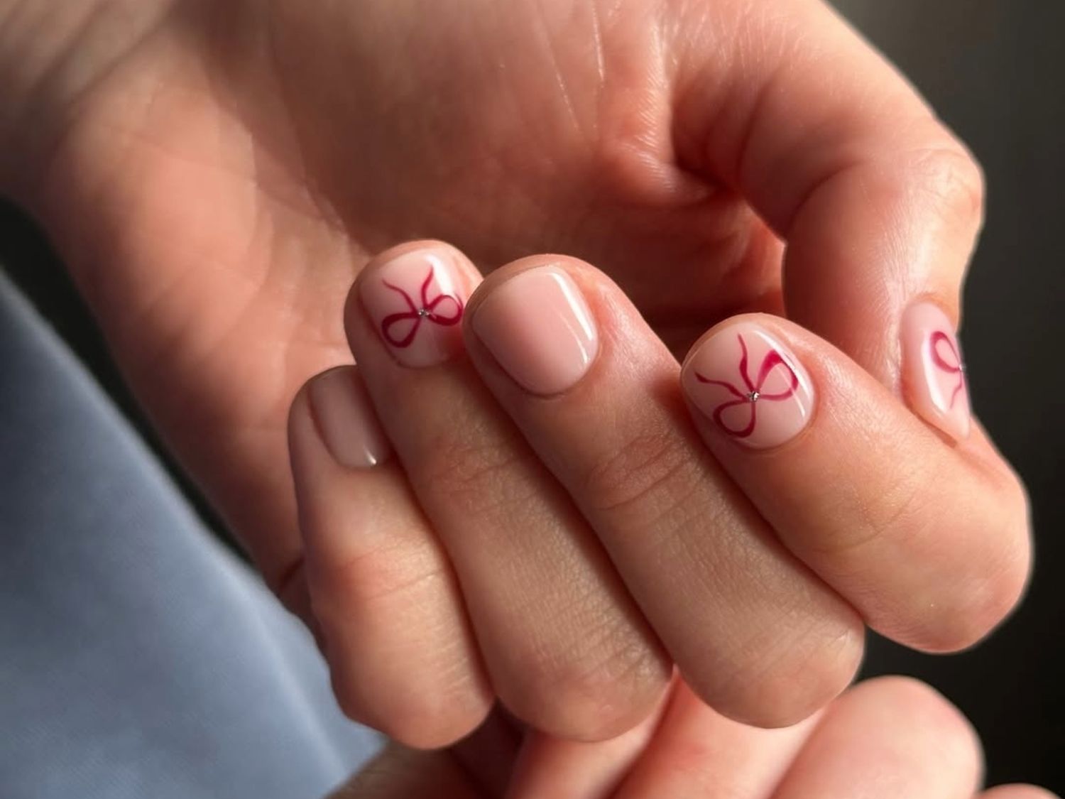 Pale Pink With Red Bow Art — Short Winter Gel Nails