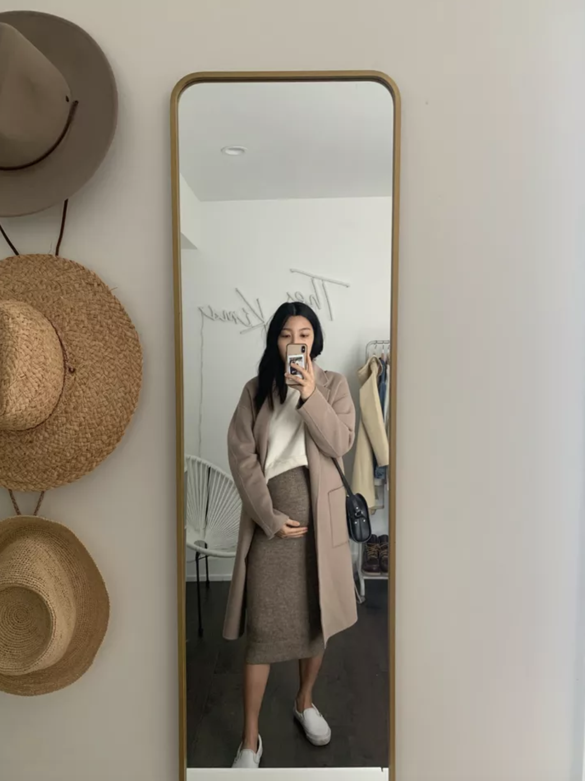 Cozy Beige Long Coat Over Cream Sweater and Brown Skirt Cozy Beige Long Coat Over Cream Sweater and Brown Skirt — Winter Maternity Outfits