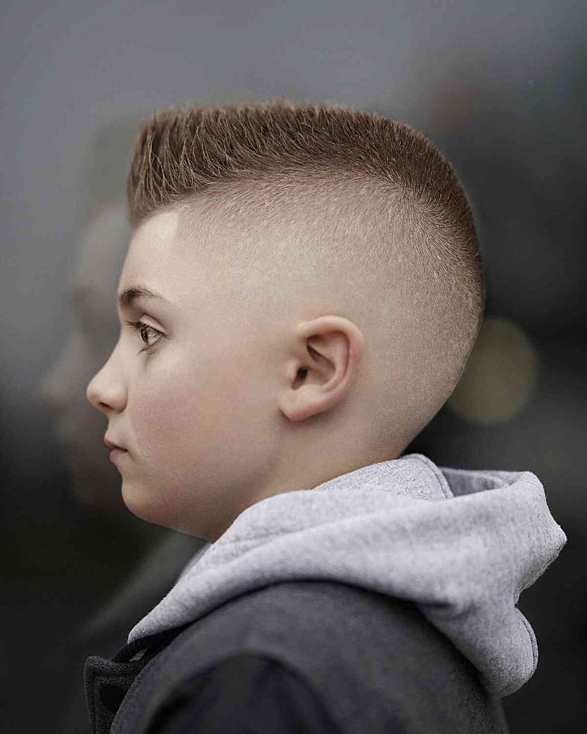 Short High Fade With Textured Top Short High Fade With Textured Top — Winter Haircuts for Boys