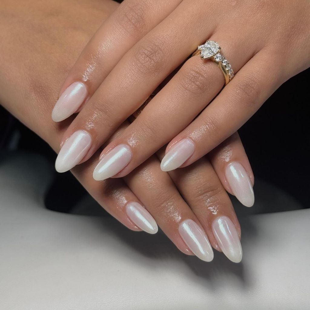 The Single Detail A Reader Notices First Luminous Pearlescent Shimmer Stiletto — Milky White Nails