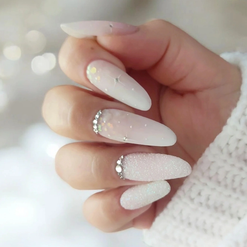 Textured Glitter Rhinestone Winter Almond Nails Textured Glitter Rhinestone Winter Almond Nails — Winter White Nails