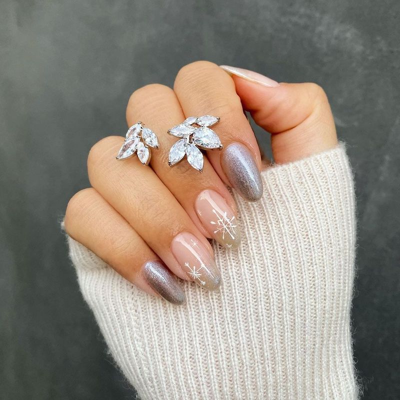Elegant Nude Shimmer Snowflake Nails Elegant Nude Shimmer Snowflake Nails