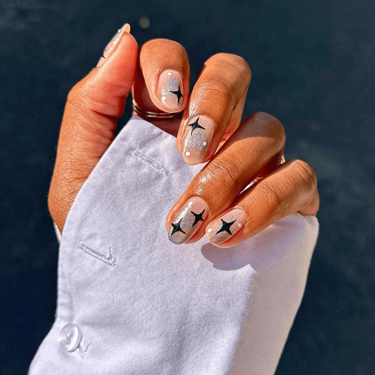 Sheer Base with Black Star Decals Sheer Base with Black Star Decals — Short Winter Nails