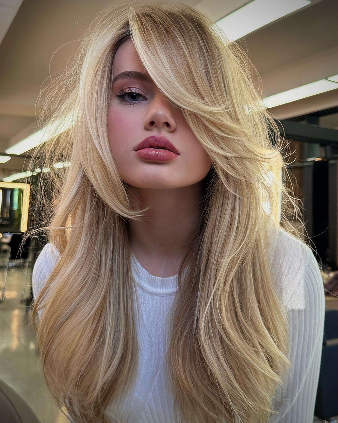 Voluminous Blonde Hair with White Ribbed Top — Blonde Hair Colour