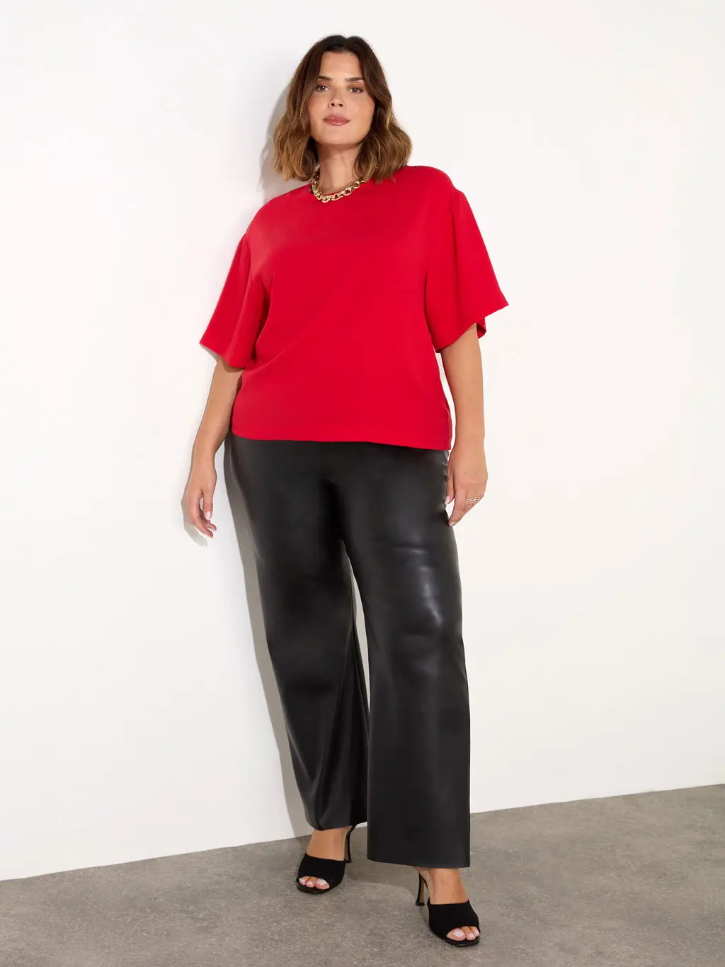 Bright Red Top with Black Wide-Leg Leather Pants Bright Red Top with Black Wide-Leg Leather Pants — Leather Pants Outfits