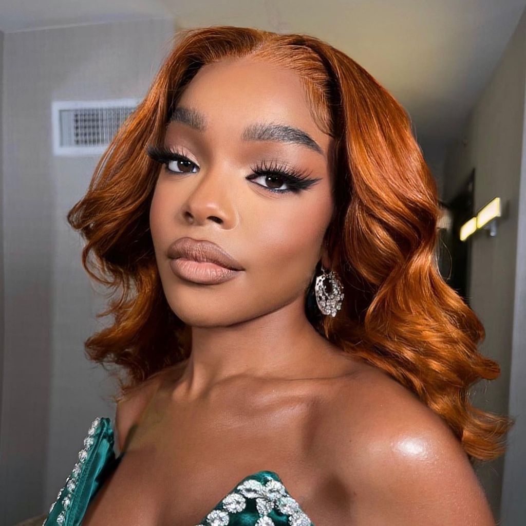 Vibrant Reddish-Orange Bob — Winter Hair Colors for Black Women