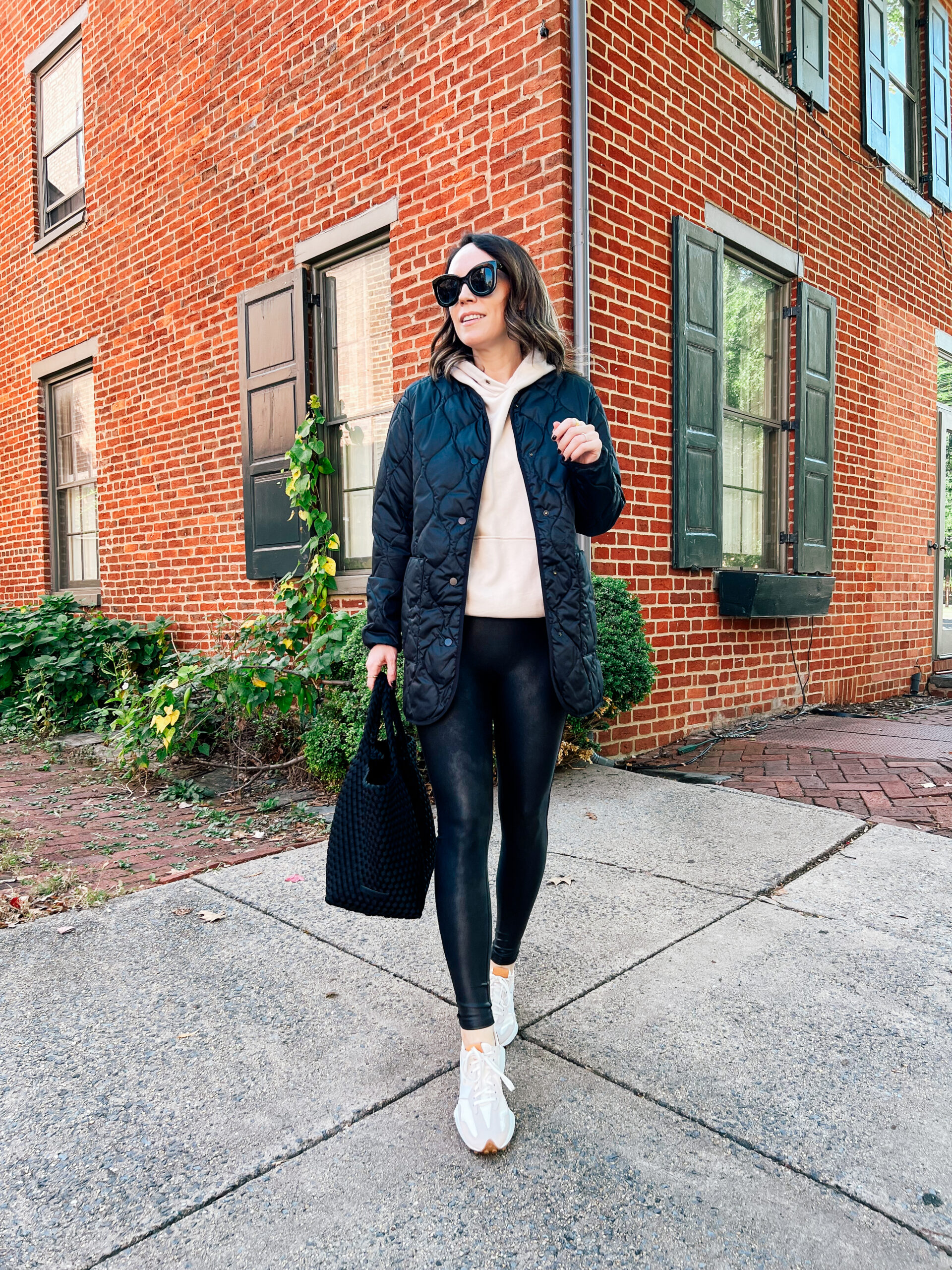 Black Puffer with Hoodie and Faux Leather Leggings Black Puffer with Hoodie and Faux Leather Leggings — Winter Puffer Jacket Outfits