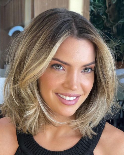 Chin Length Layered Bob With Side Bangs Chin Length Layered Bob With Side Bangs — Medium Length Winter Haircuts
