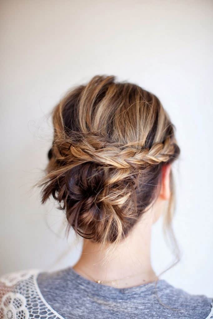 Medium Brown Braided Bun With Loose Strands — Easy Winter Hairstyles