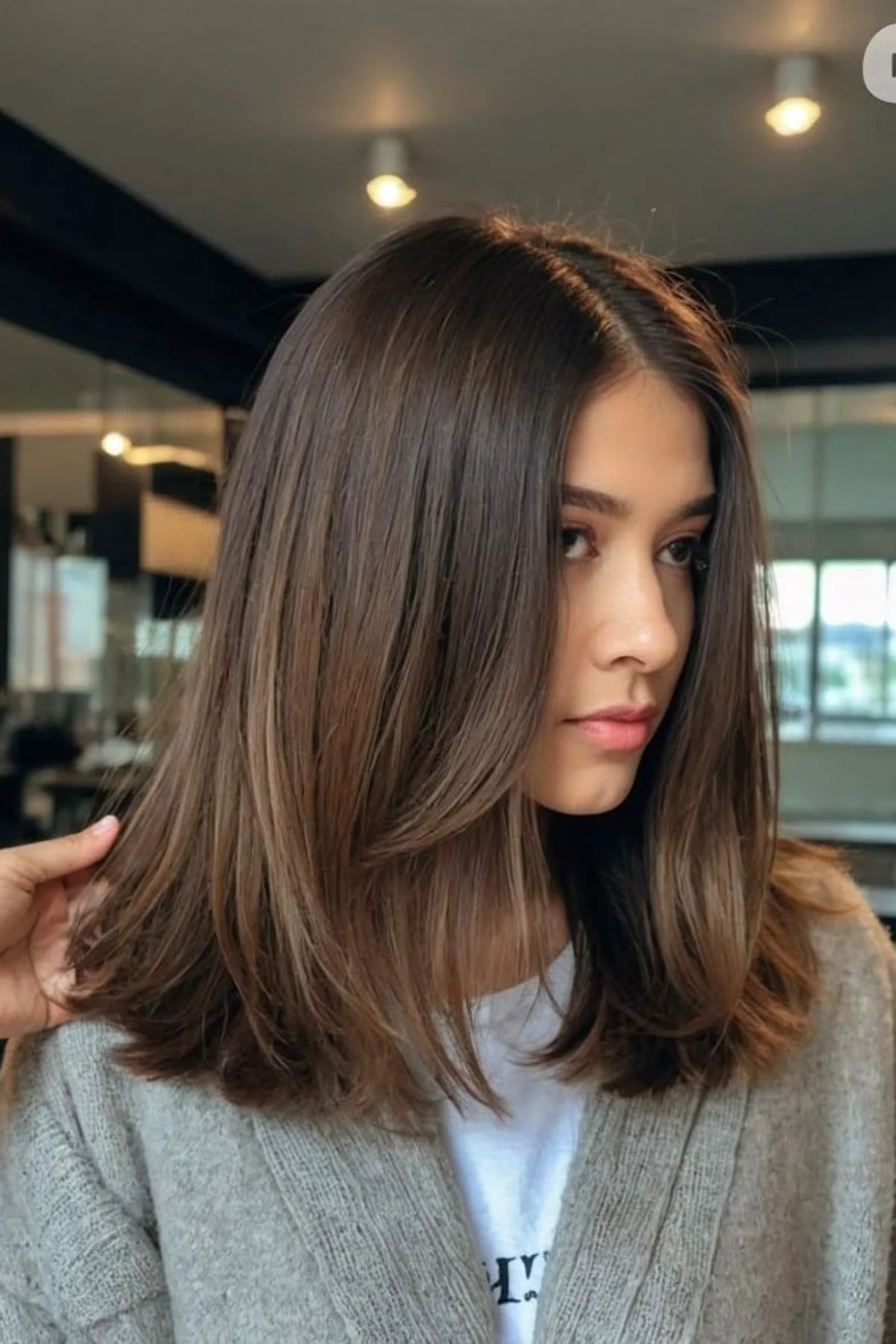 Medium Brown Layers With Curtain Bangs Medium Brown Layers With Curtain Bangs — Winter Haircuts for Straight Hair