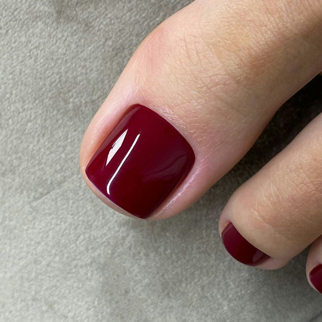 Deep Berry Red Glossy Toes — The Cuticle Area Is Clean Deep Berry Red Glossy Toes — The Cuticle Area Is Clean — Winter Pedicure Colors