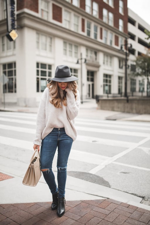 Fedora Flair: Beige Sweater with Ripped Jeans Fedora Flair: Beige Sweater with Ripped Jeans — Oversized Sweater Outfits