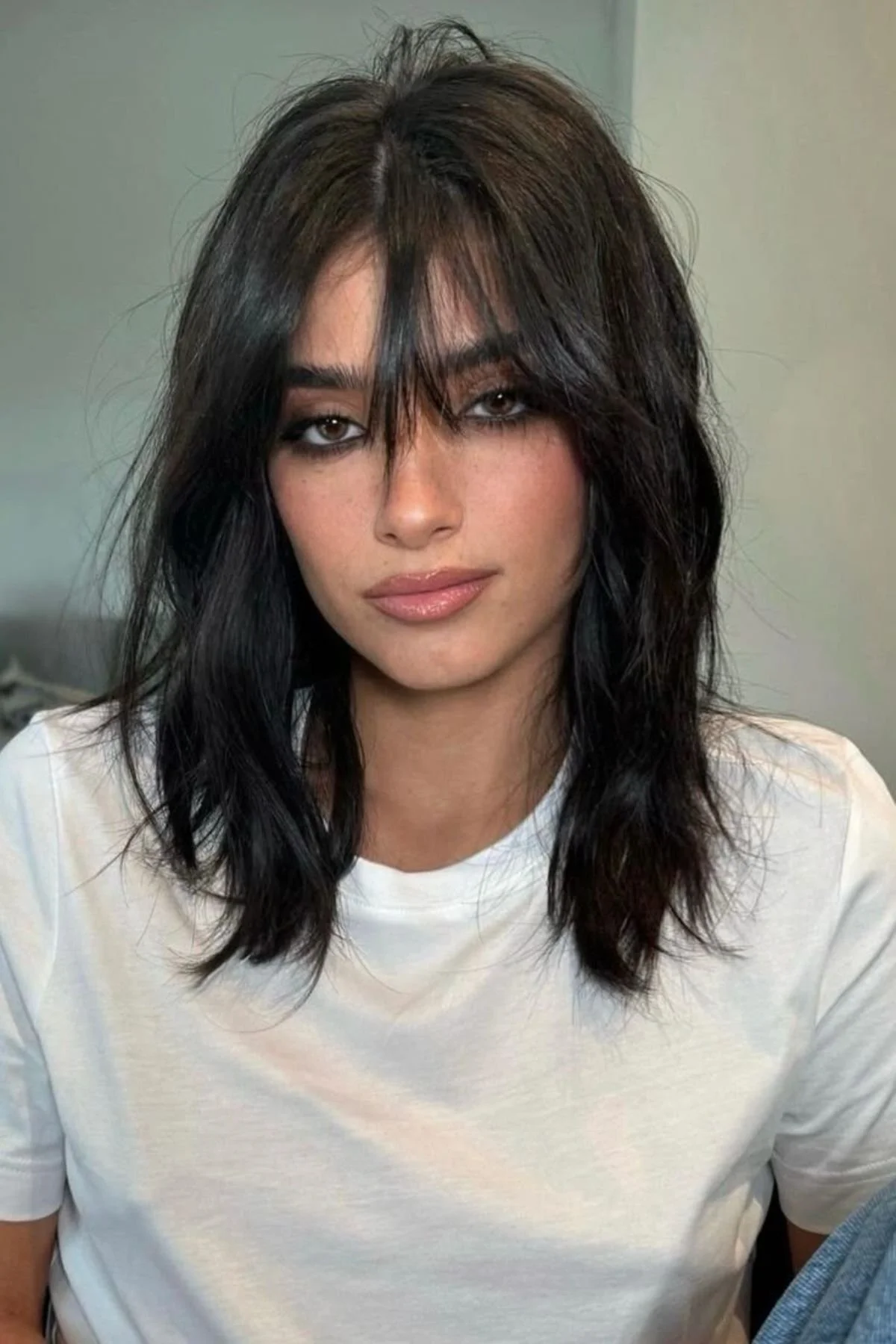 Collarbone Dark Brown Layered Lob Collarbone Dark Brown Layered Lob — Winter Hairstyles with Bangs