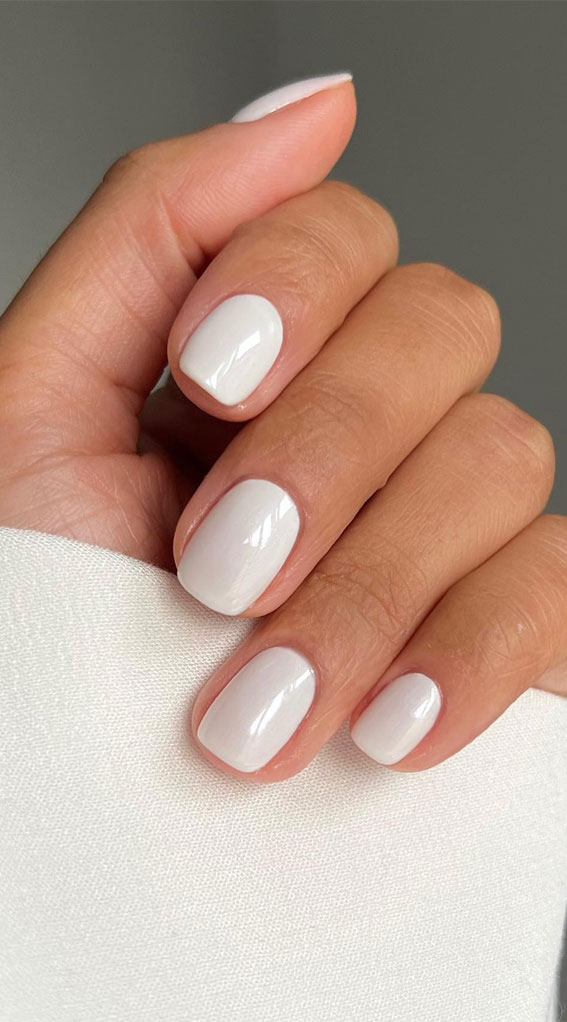Opaque Cool White Glossy Short Oval Nails Opaque Cool White Glossy Short Oval Nails — Natural Winter Nails
