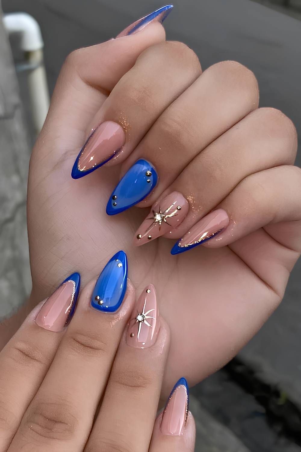 Long Stiletto Blue Tips with Gold Foil and Studs — Blue Nail Inspo