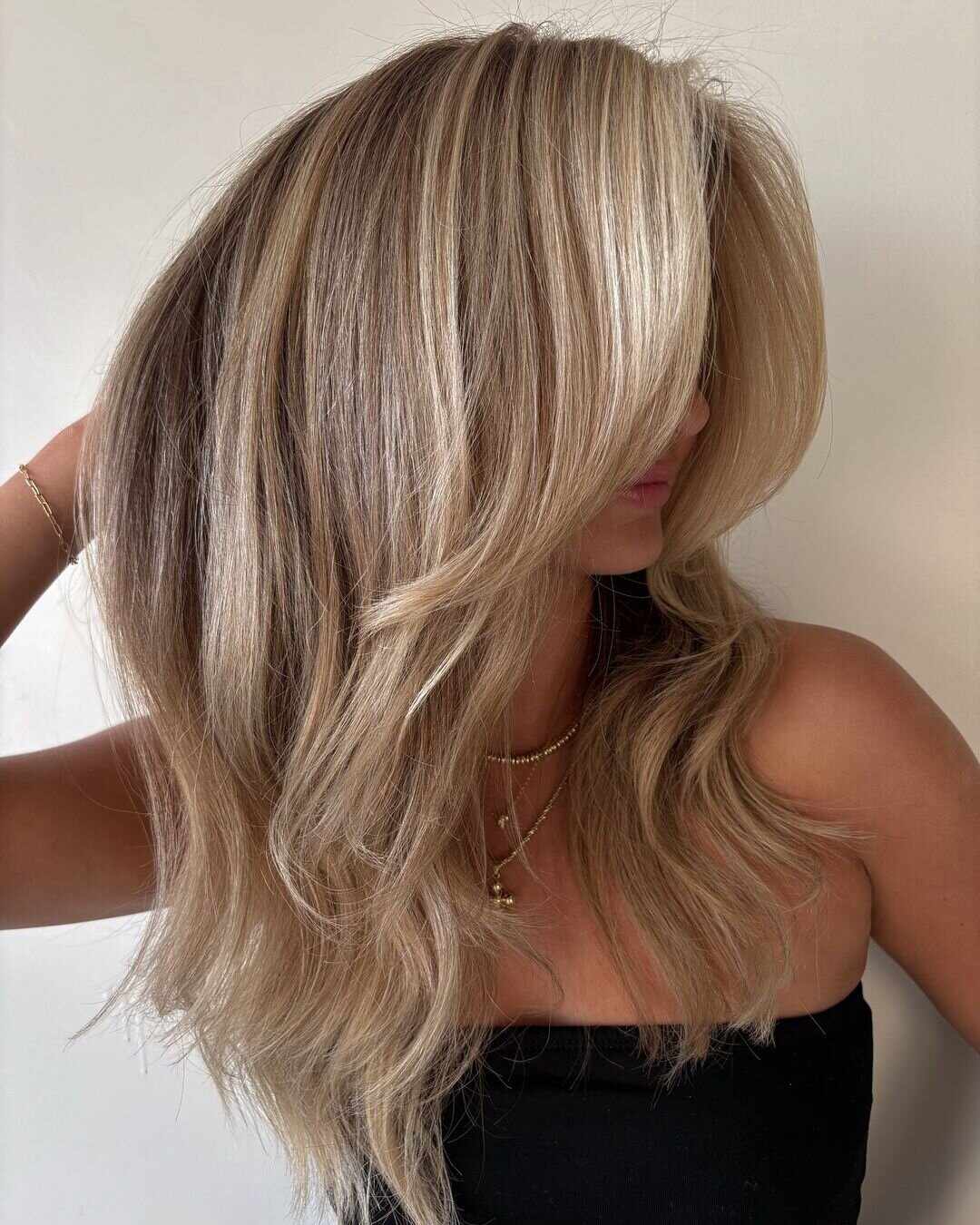 Dark Blonde With Ash Highlights Blowout Dark Blonde With Ash Highlights Blowout — Winter Haircuts for Long Faces