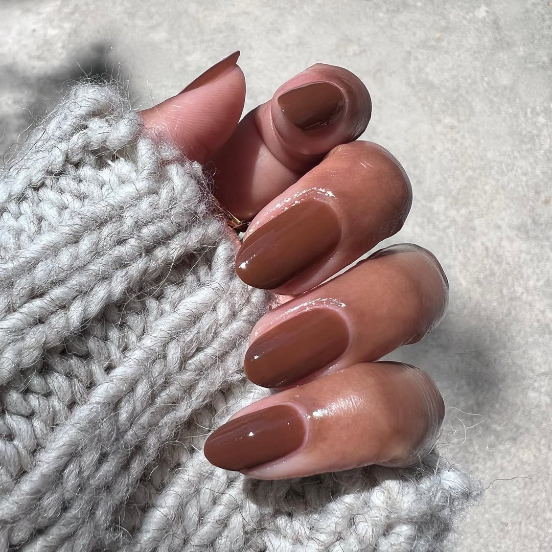 Light Cool Beige Glossy Medium Almond Nails Light Cool Beige Glossy Medium Almond Nails — Winter Nail Colors for Dark Skin