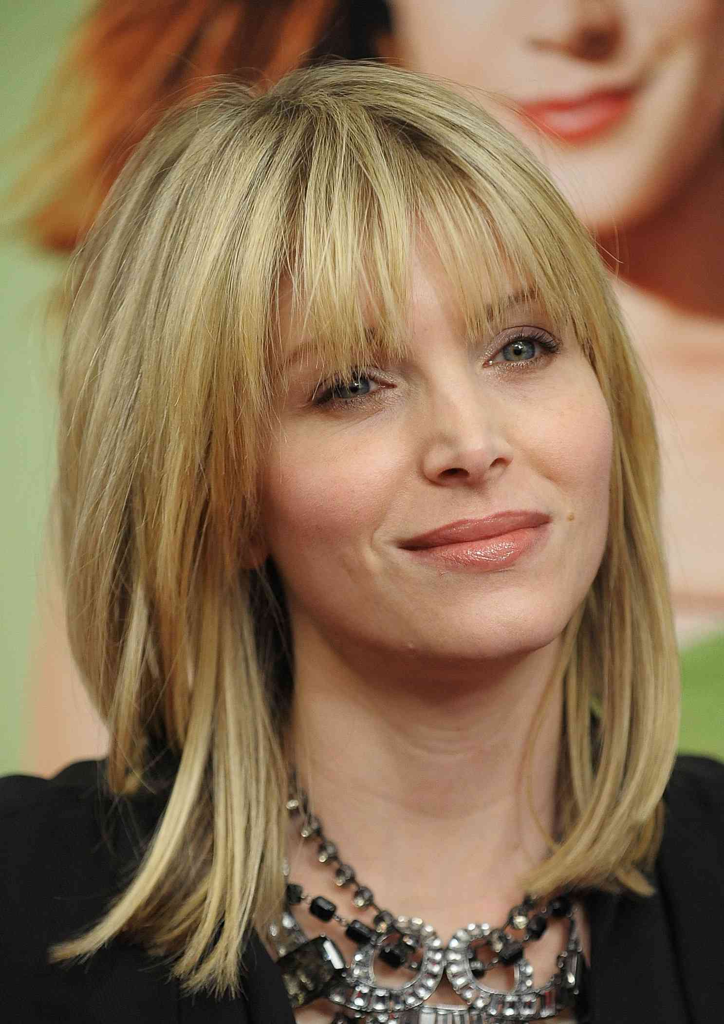 Chin Length Ash Blonde Bob With Side Bangs Chin Length Ash Blonde Bob With Side Bangs — Winter Haircuts for Heart Shaped Faces
