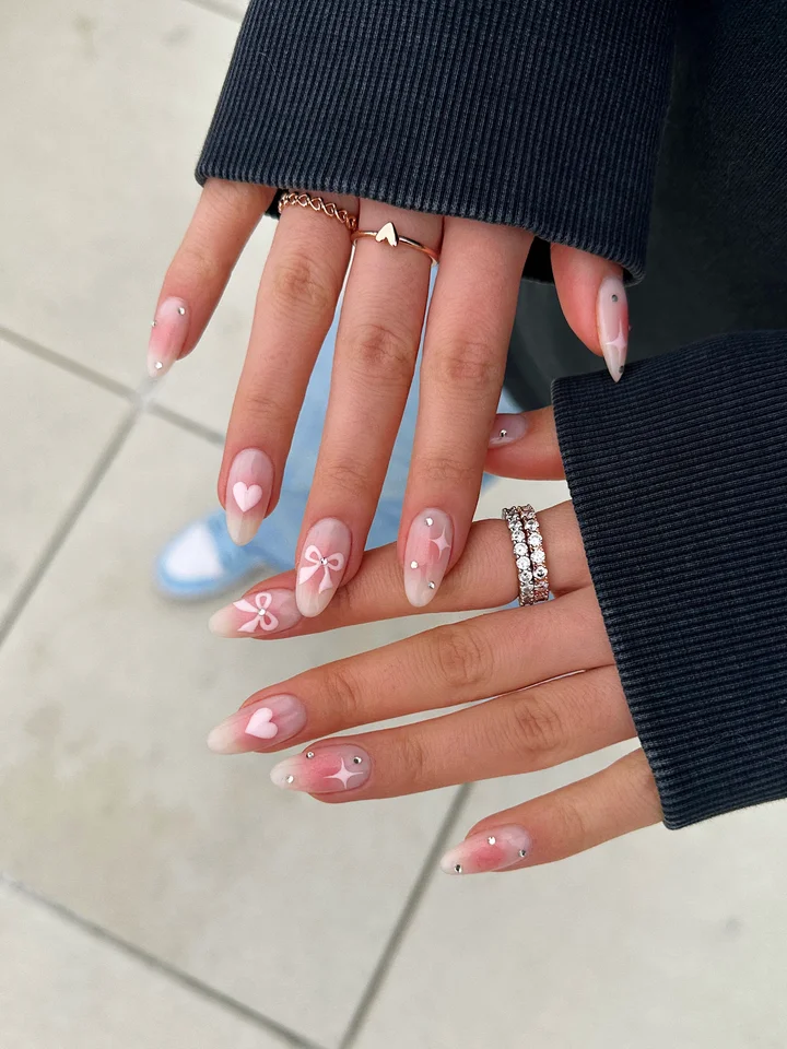 Medium Oval Sheer Pink with Hearts and Bows Medium Oval Sheer Pink with Hearts and Bows — Winter Pink Nails