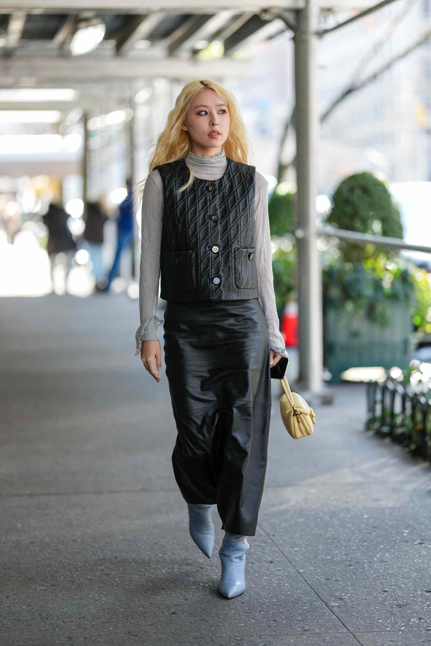 Textural Mix: Black Leather Maxi Skirt with Quilted Vest and Turtleneck Textural Mix: Black Leather Maxi Skirt with Quilted Vest and Turtleneck — Leather Skirt Outfits