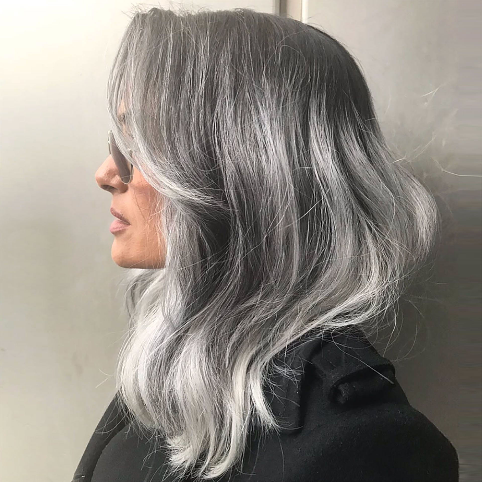 Collarbone Lob With Silver Strands Collarbone Lob With Silver Strands — Gray Blending Highlights