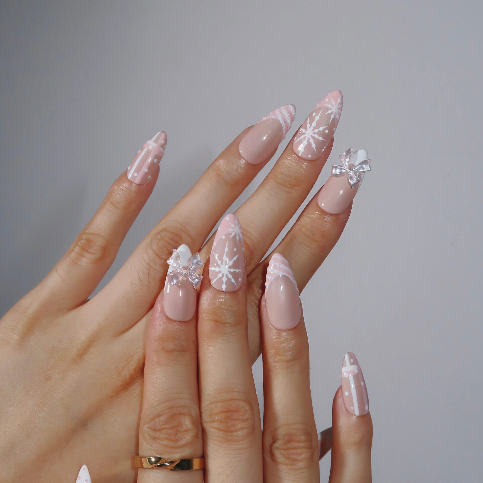 Snowflakes Bows And Striped Pattern Visual Idea Snowflakes Bows And Striped Pattern Visual Idea — Winter Nude Nails
