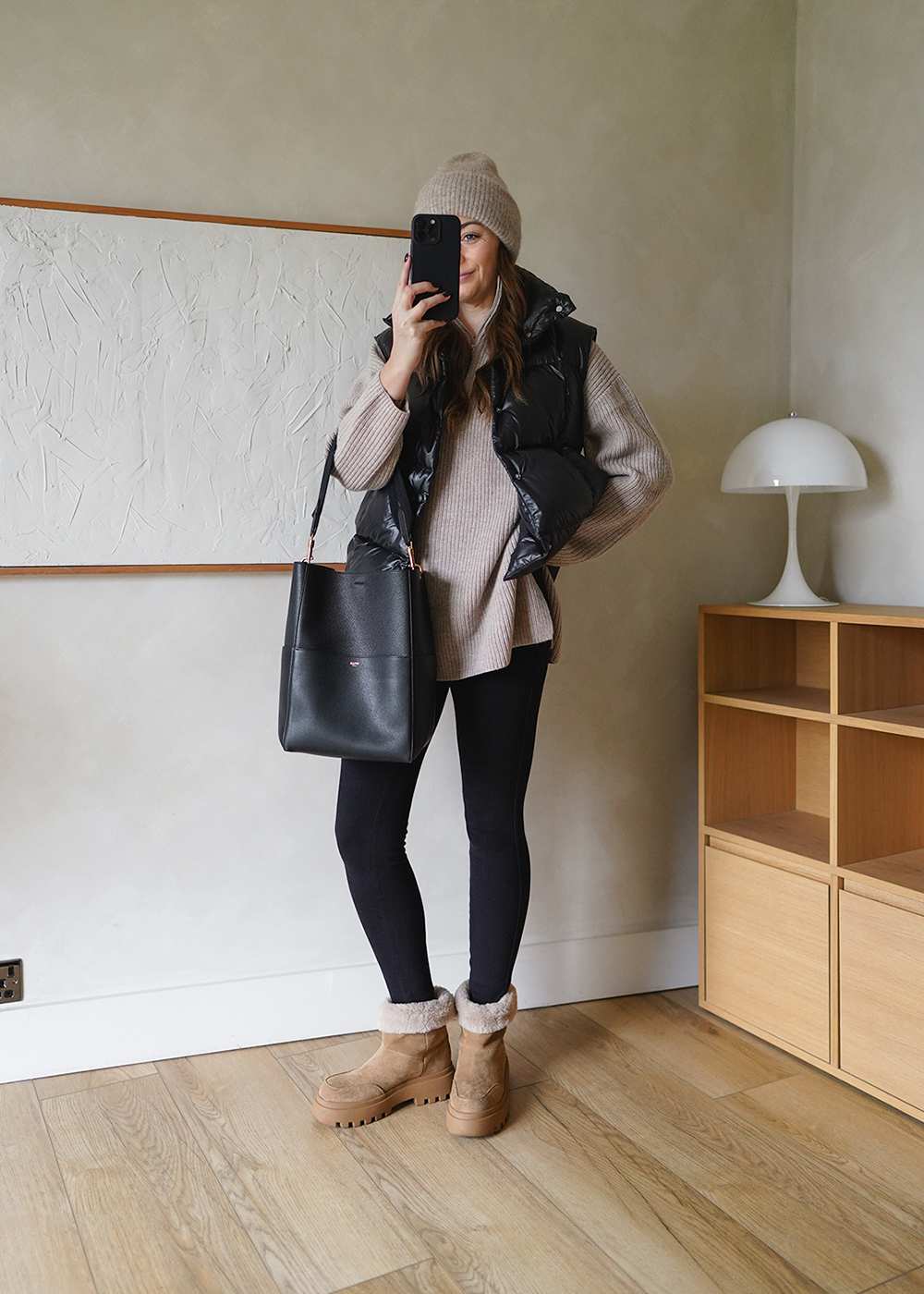 Puffer Vest Layering: Uggs with Beanie and Knit Sweater — Ugg Boots Outfits