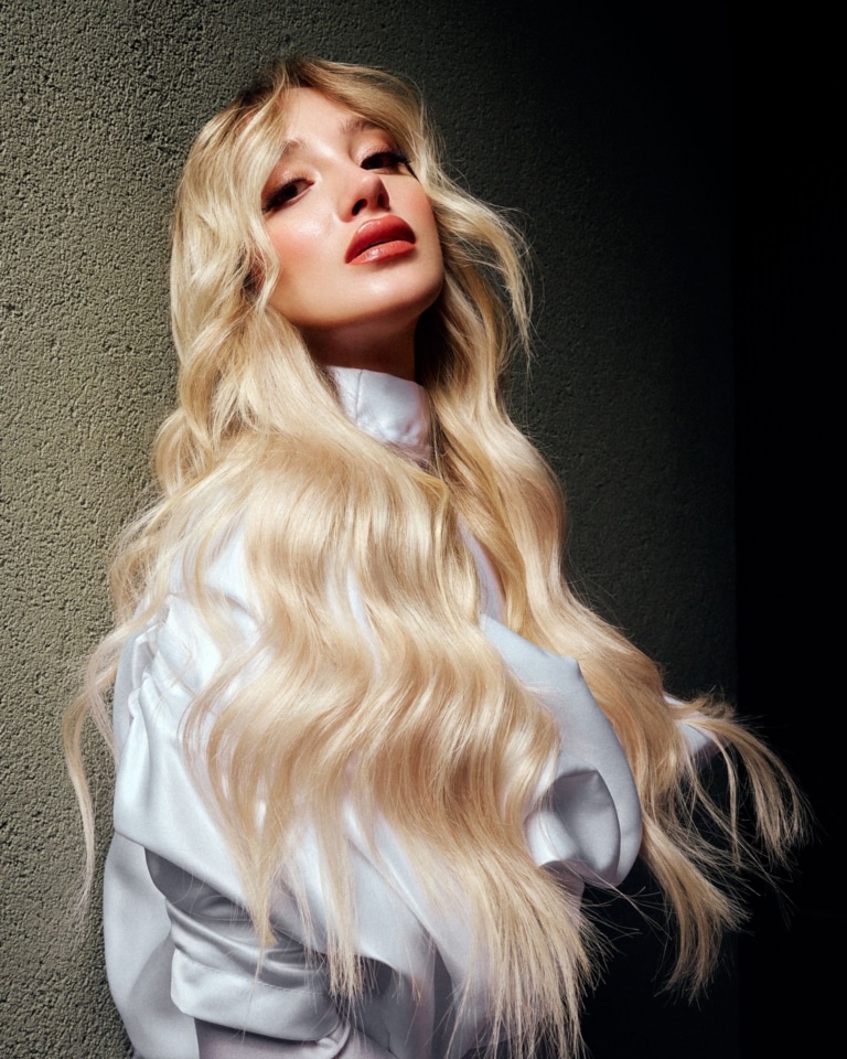 Long, Wavy Light Blonde Hair with a White Satin Top — Blonde Hair Colour