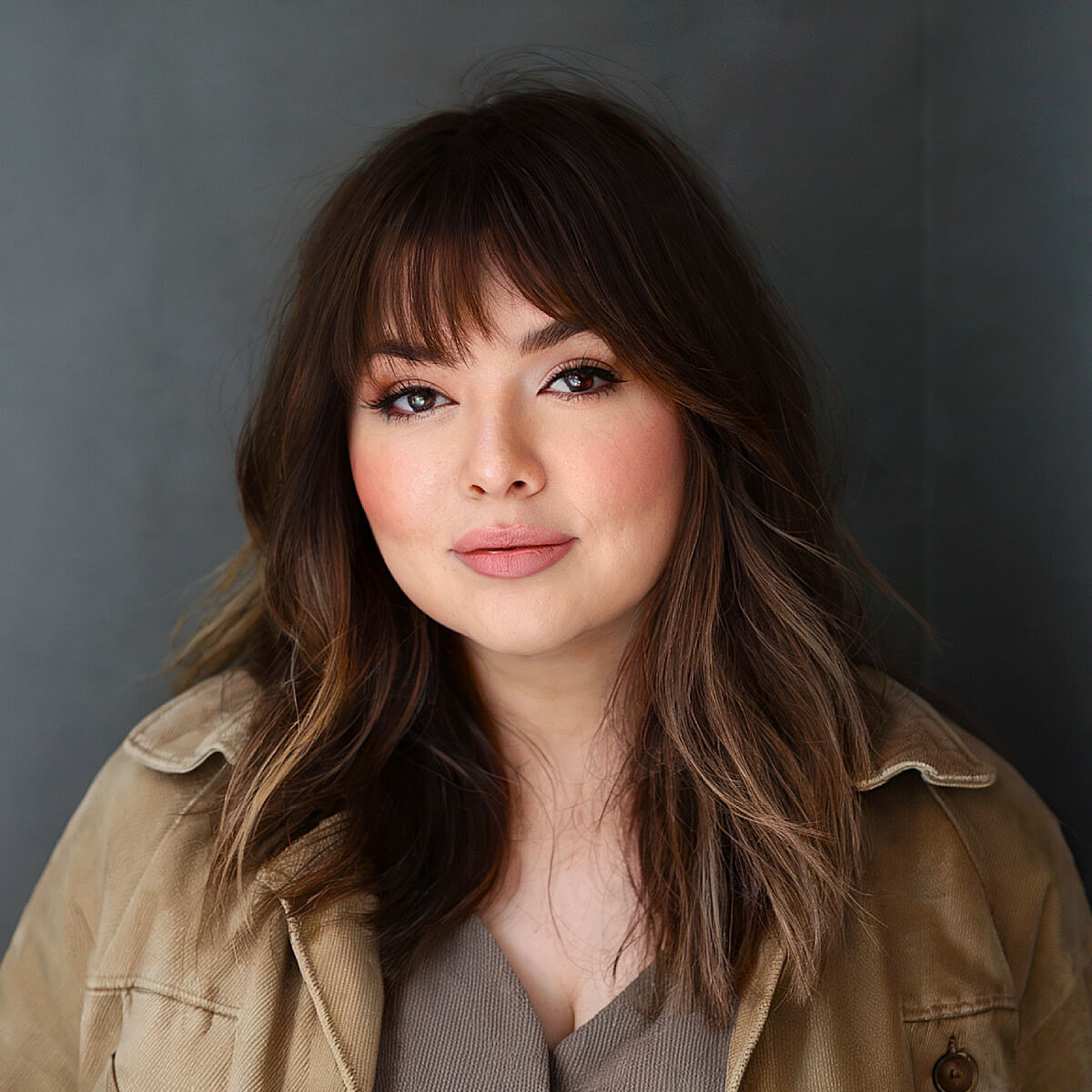 Layered Shag With Curtain Bangs Layered Shag With Curtain Bangs — Winter Haircuts for Heart Shaped Faces