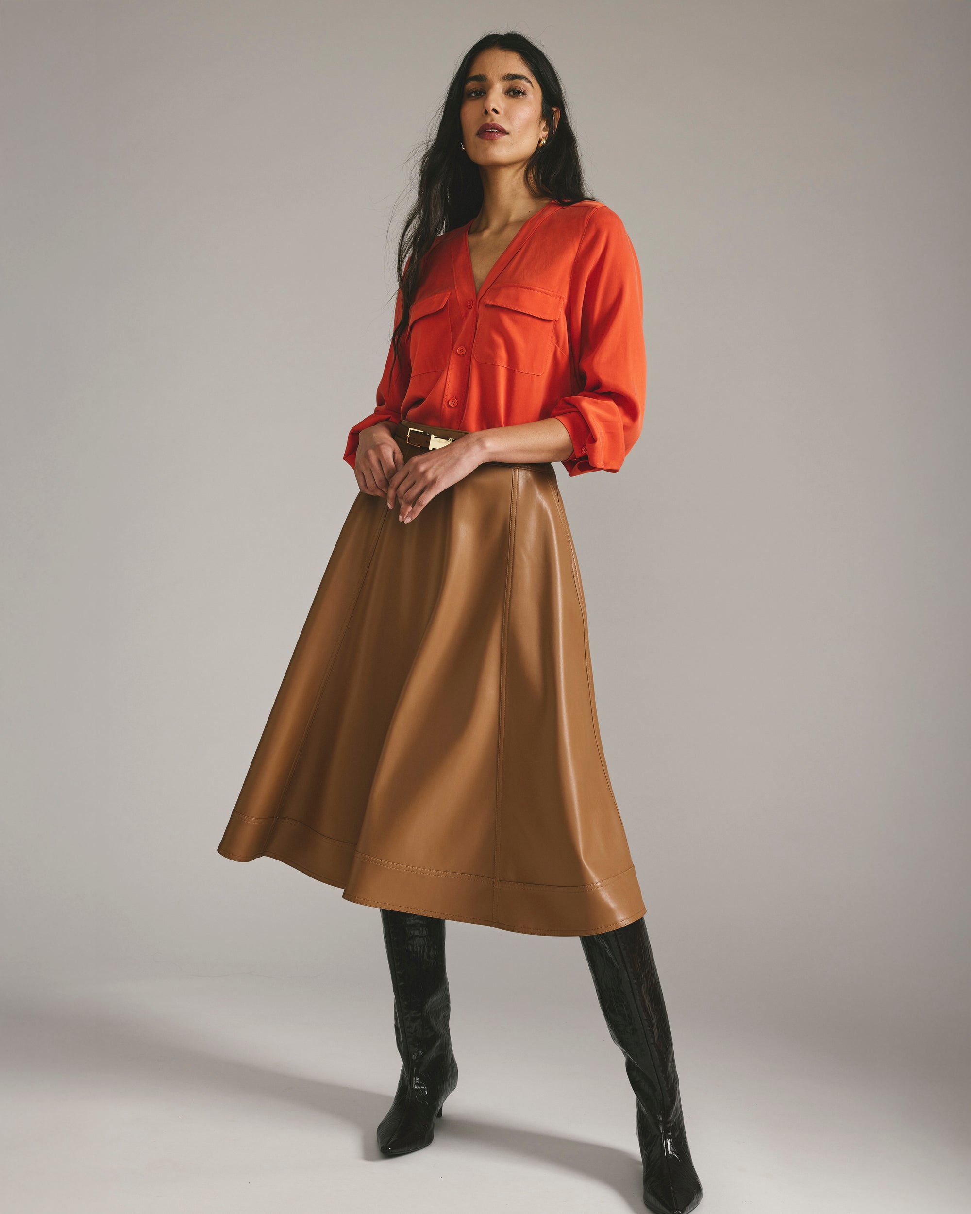 Glamorous Touch: Camel Leather Midi Skirt with Orange Shirt and Sequined Boots Glamorous Touch: Camel Leather Midi Skirt with Orange Shirt and Sequined Boots — Leather Skirt Outfits